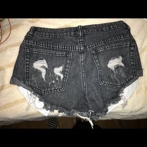 Black distressed shorts